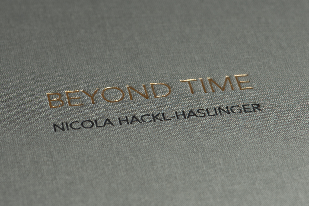 © Nicola Hackl-Haslinger, The Embossed Title in Gold and Dark-Grey